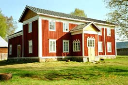 Signegården, röd, stor träbyggnad i gammal stil